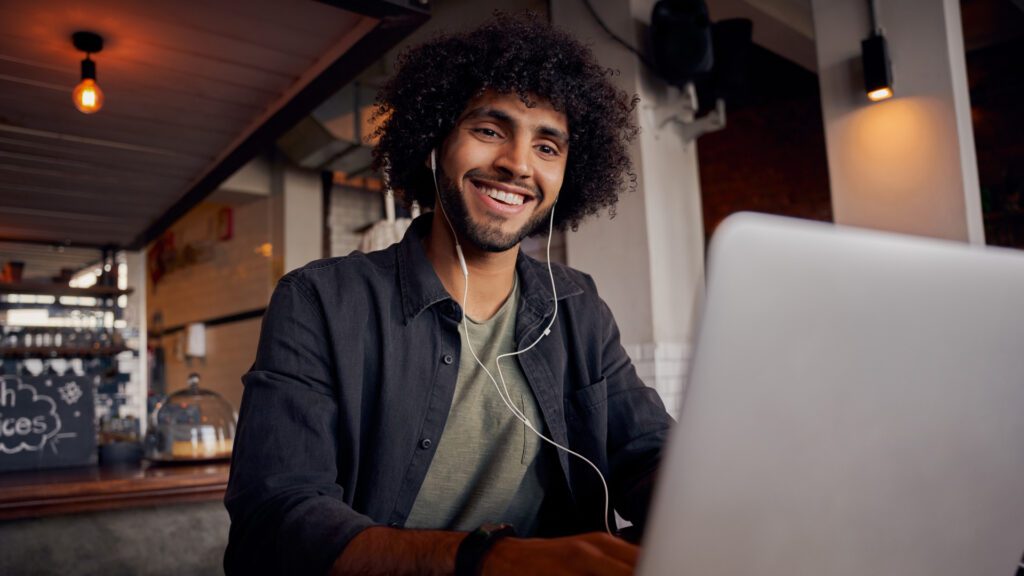 A man works at his laptop