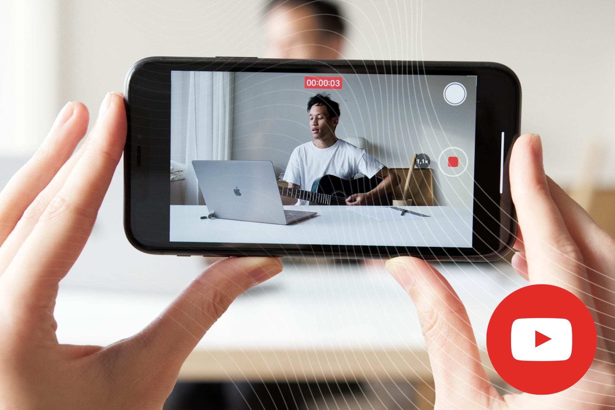  A person is holding a smartphone in their hand and watching a YouTube video about video marketing trends and innovations.