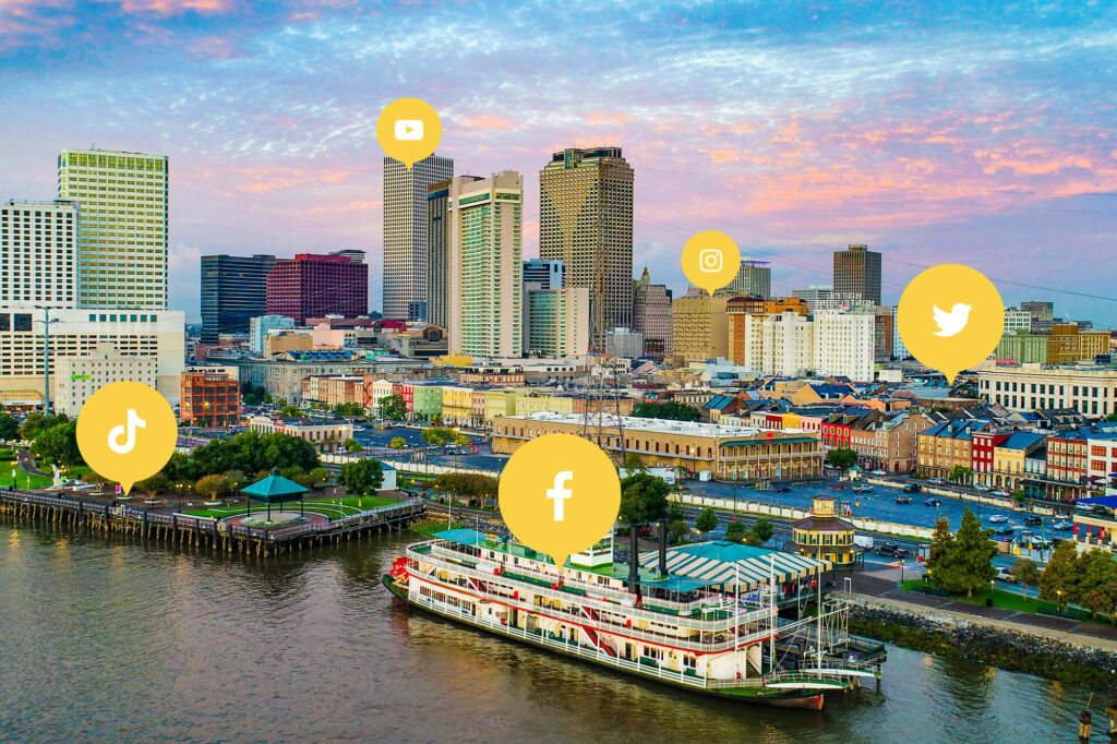 New Orleans with social media icons in yellow and white