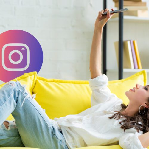 A woman on a yellow sofa