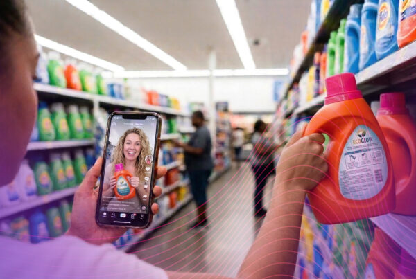 woman watching social post about which product to buy in grocery store