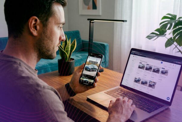 Man looking at cars on social media and going to a car dealership website