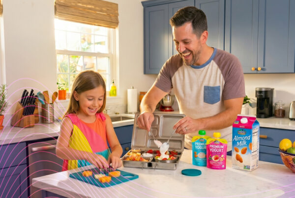 From Algorithm to Aisle - Father and daughter making a box school lunch in the family kitchen