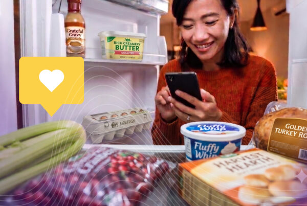 IZEA - Creator-led content production - woman looking in fridge to check her groceries for a Thanksgiving meal