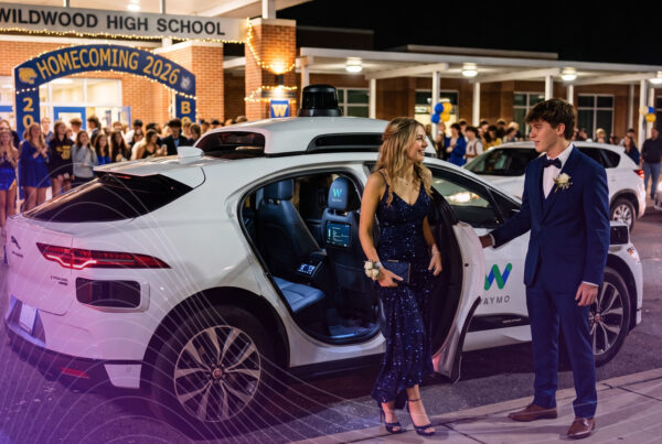 Couple arriving the homecoming in a Waymo