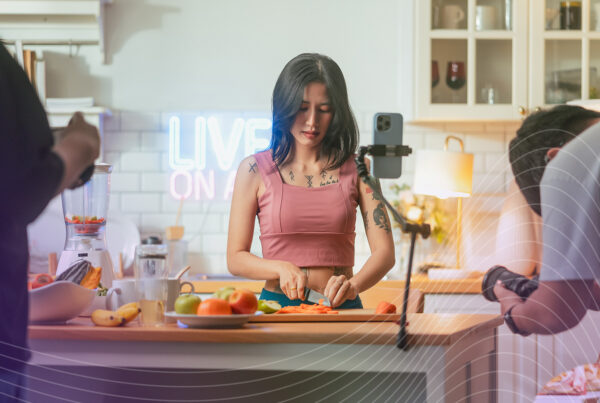 Influencer cooking with creative team